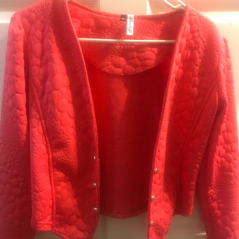 A blazer or Jacket or capes